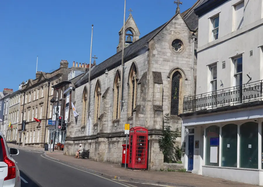 Listed stone church and Georgian buildings on High West Street, Dorchester