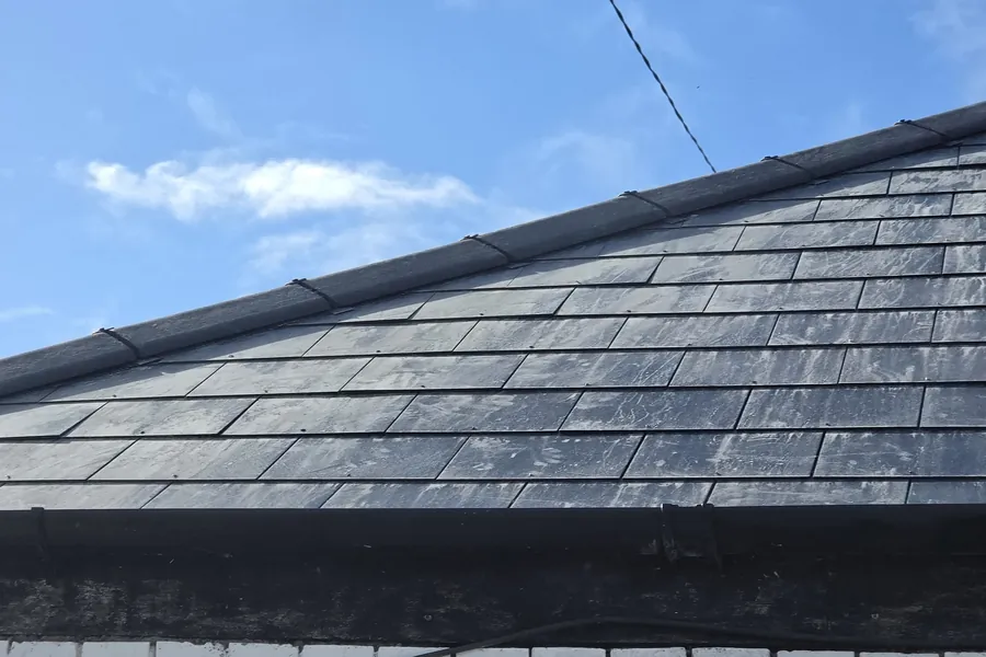 Slate roof replaced like-for-like, matching the original look so no planning application was needed