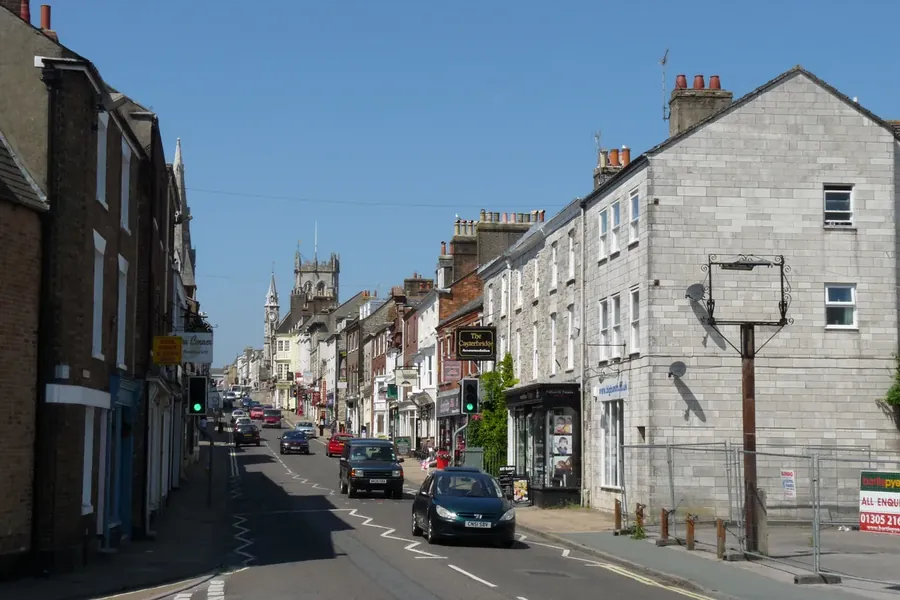 Stone and brick buildings with slate roofs along High East Street in Dorchester