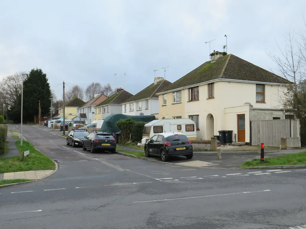 Semi-detached houses with tiled hipped roofs on Chelmsford Road, Upton