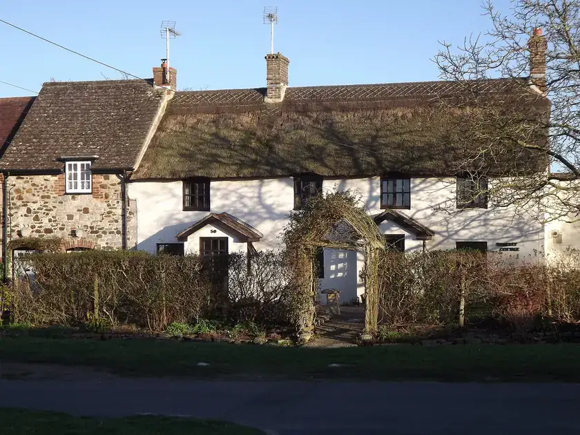 Thatched and slate-roofed cottages on Spring Street, Wool
